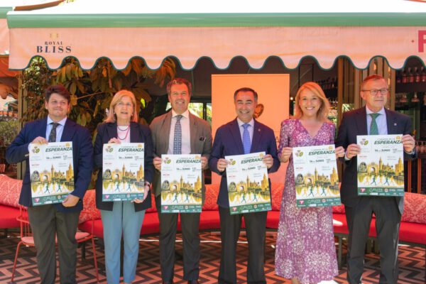 Cartel oficial de la I Carrera de la Esperanza organizada por la Hermandad de la Macarena junto al Guadalquivir en Sevilla.