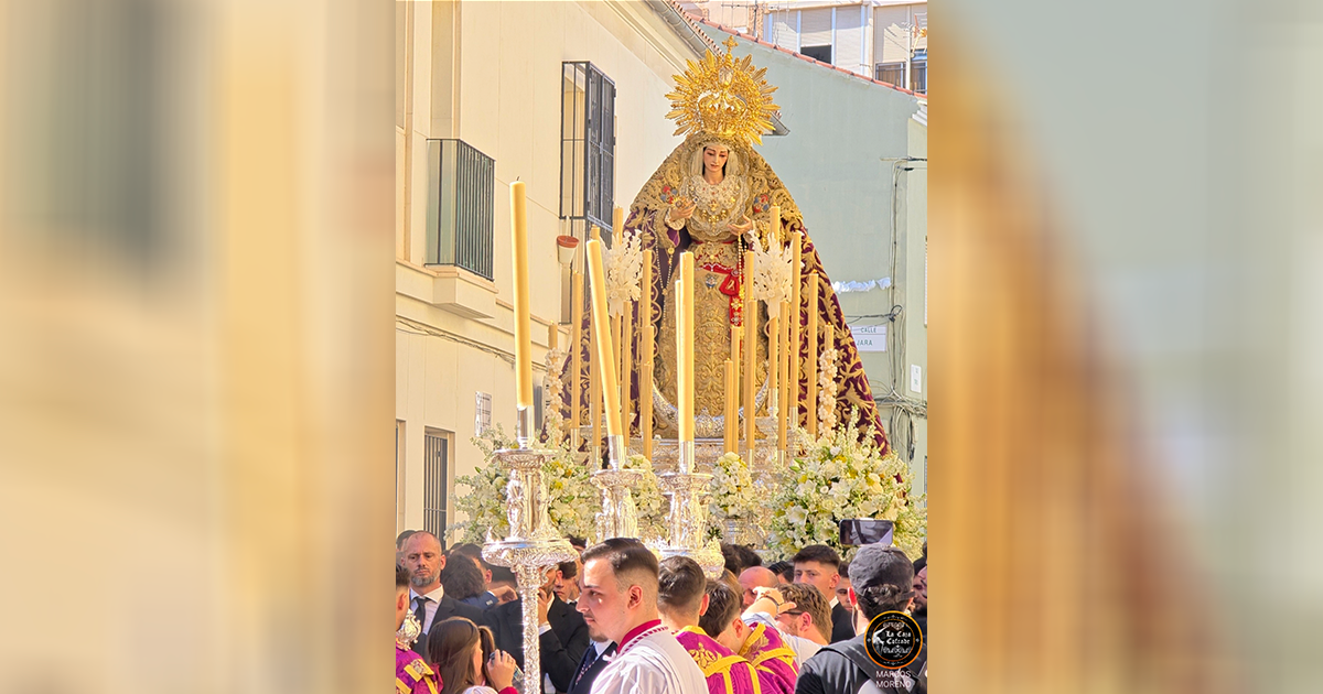 Virgen de la Trinidad Coronada durante su procesión por las calles del barrio de la Trinidad en Málaga en mayo de 2026.
