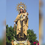 Virgen del Carmen de El Palo durante su procesión marítimo-terrestre en Málaga fotografiada por Marcos Moreno.