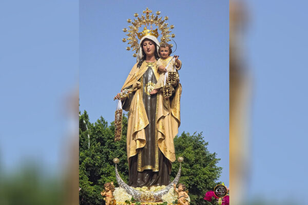 Virgen del Carmen de El Palo durante su procesión marítimo-terrestre en Málaga fotografiada por Marcos Moreno.