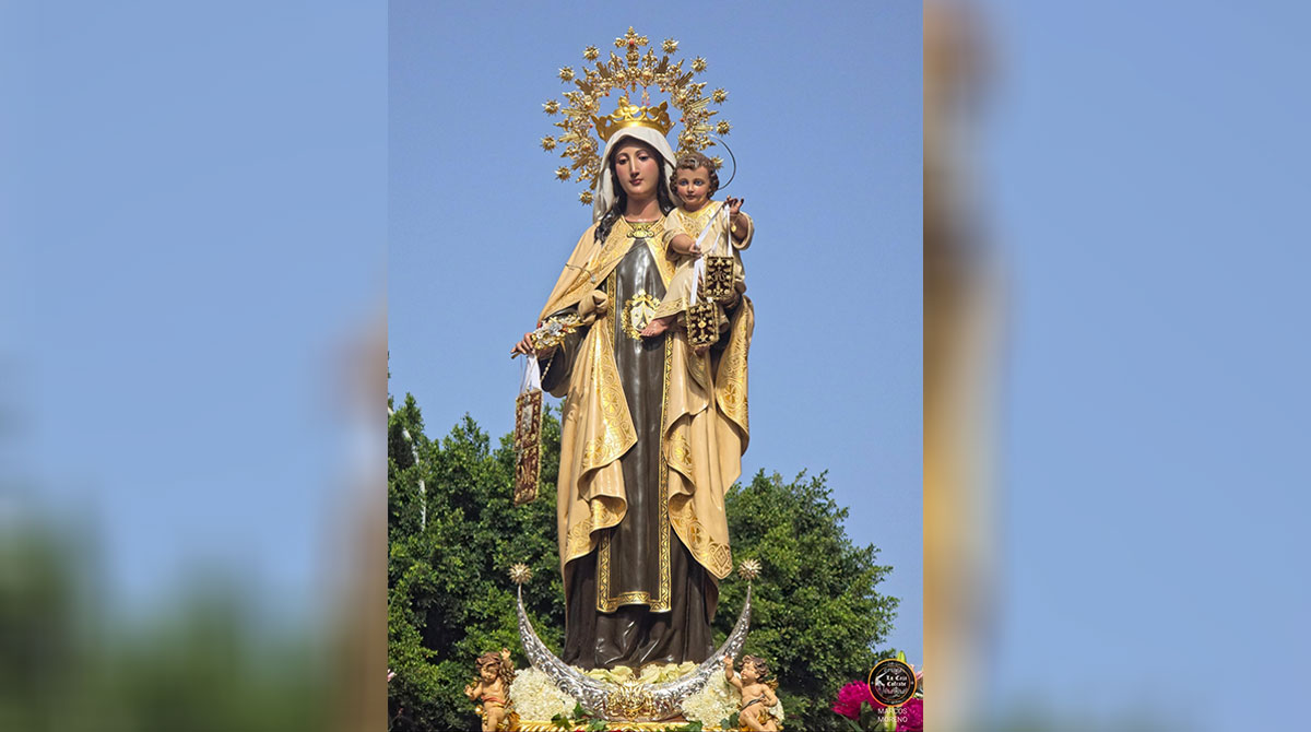 Virgen del Carmen de El Palo durante su procesión marítimo-terrestre en Málaga fotografiada por Marcos Moreno.